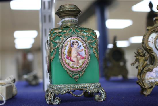 A 19th century French gilt metal mounted glass scent bottle, inset with painted and enamelled plaques, height 13cm
